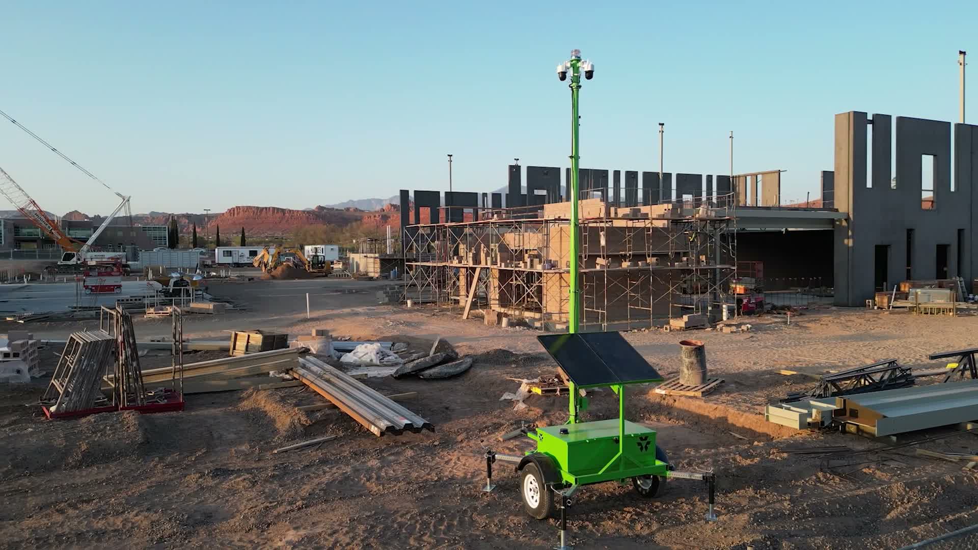Anasazi Security solar camera trailer deployed at a St. George construction site at golden hour